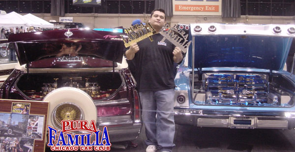 Rene with his 93 Caddy and 63 Impala at World of Wheels 2005